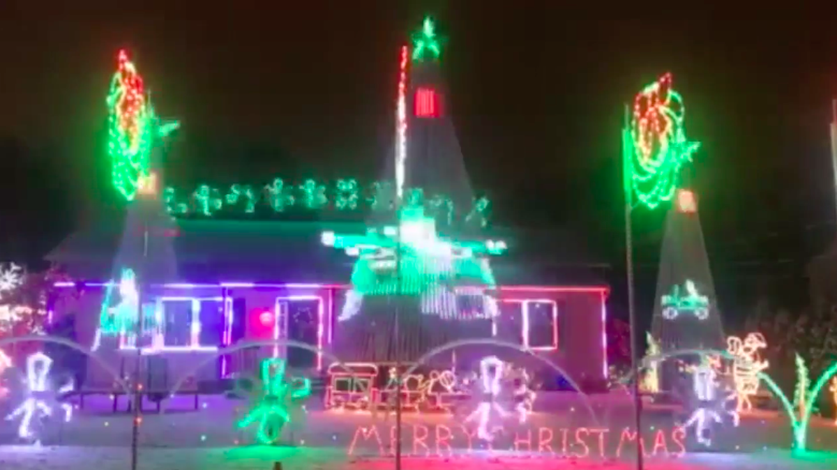 Tom Apruzzi of Old Bridge, NJ, says city officials have ordered him to pay $2,000 per day to cover safety issues involving people gathering to see his Christmas display. He says he will not shut down the display.