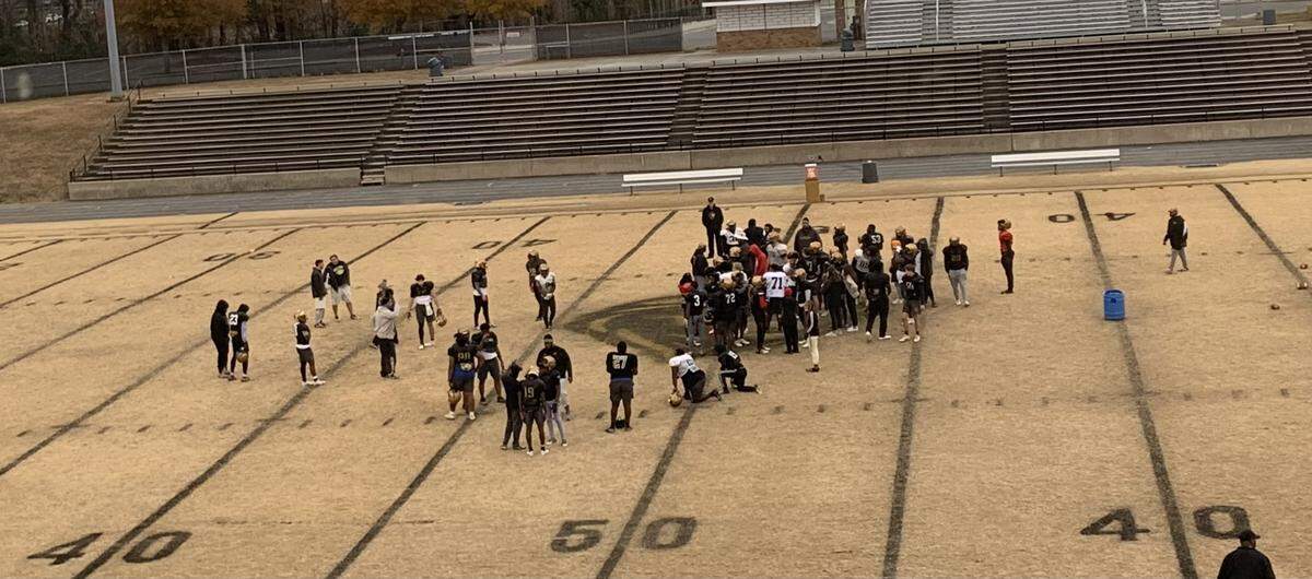 In 1989, assistant coaches lining the field for a Shelby football game ran out of white paint. They used black instead and everyone liked it. So now, the field is lined in black every year during playoff time, once the grass goes dormant.