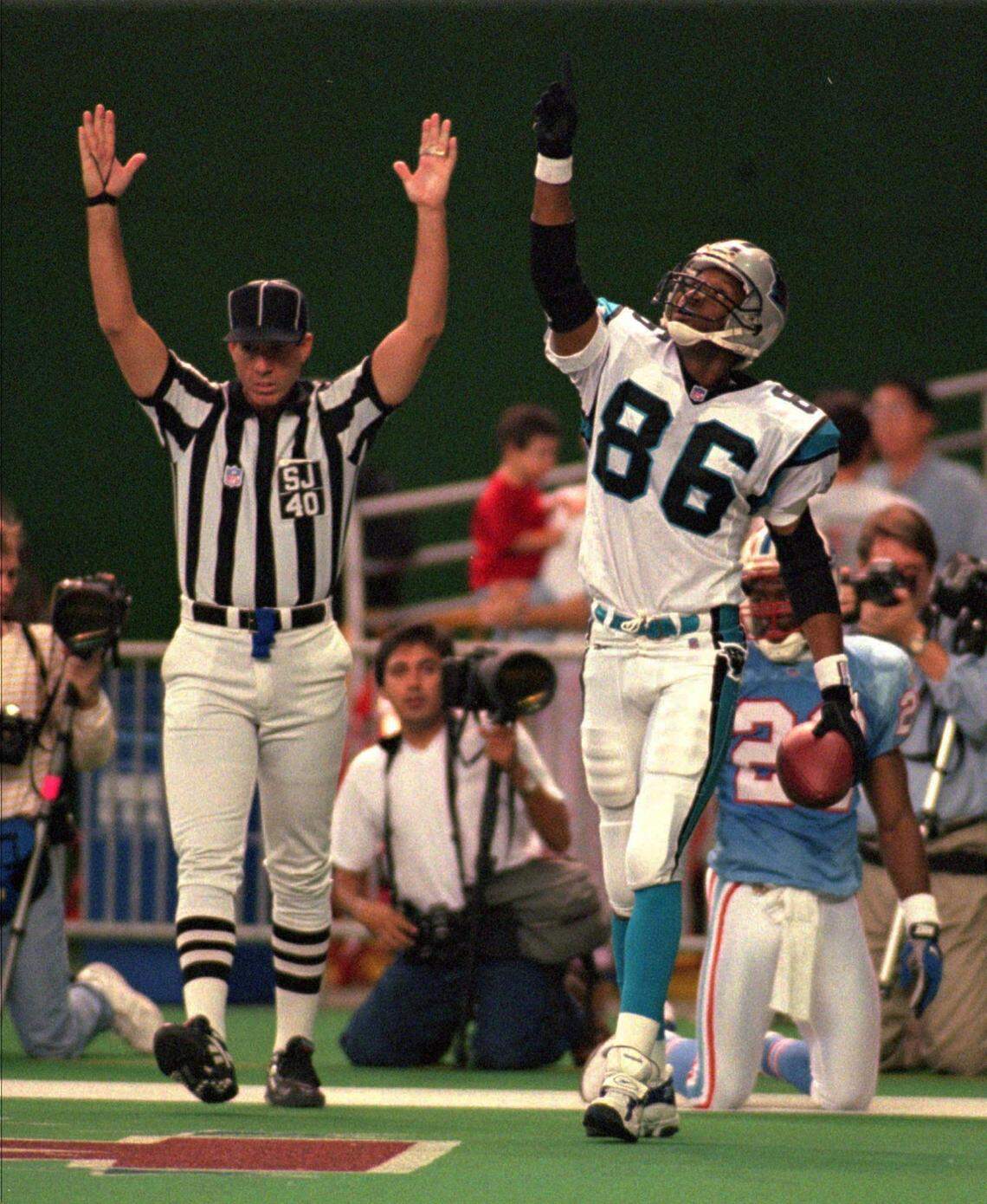 In 1996, Panthers wide receiver Willie Green pointed to the sky after scoring a touchdown. Green later played for both of the Denver teams that won the Super Bowl in the late 1990s, catching passes from John Elway and teaming with Ed McCaffrey.