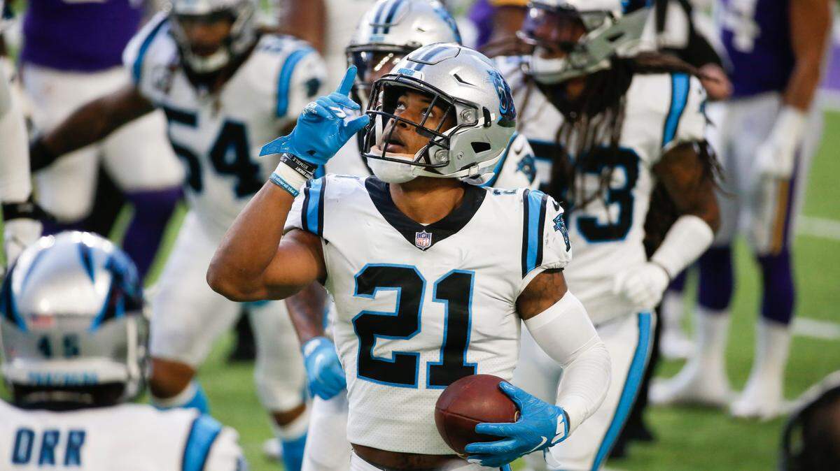 Carolina Panthers safety Jeremy Chinn celebrates after returning a fumble 17-yards for a touchdown during the second half of an NFL football game against the Minnesota Vikings, Sunday, Nov. 29, 2020, in Minneapolis. (AP Photo/Bruce Kluckhohn)