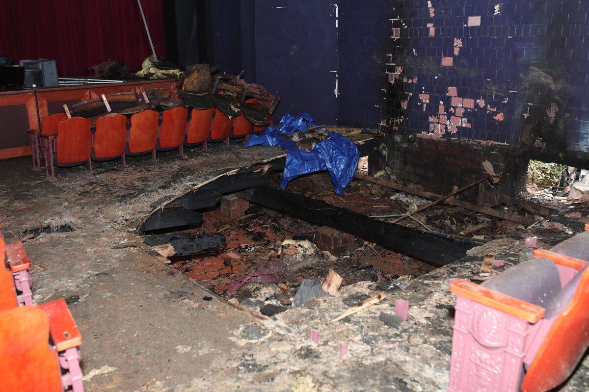 Charlotte Theatre sustained far more loss in Monday’s electrical fire than the $50,000 fire officials estimated, its leaders said.