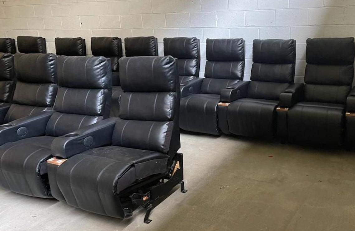 Charlotte Film Society is ramping up its latest fundraising campaign to purchase seating (shown in storage) for its three-screen movie theater art house in NoDa by late November.