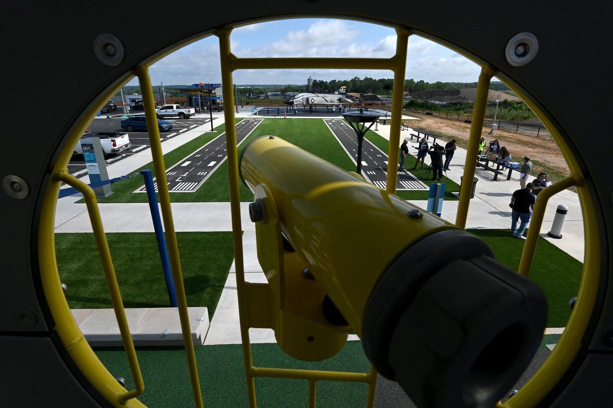 The new Airport Overlook was unveiled on Thursday at Charlotte Douglas International Airport. The 600,000-square-foot area includes an airfield, skyline views and terminal views from the location at 5130 Airport Overlook Drive. Children can enjoy a playground where they can look at planes through a telescope.