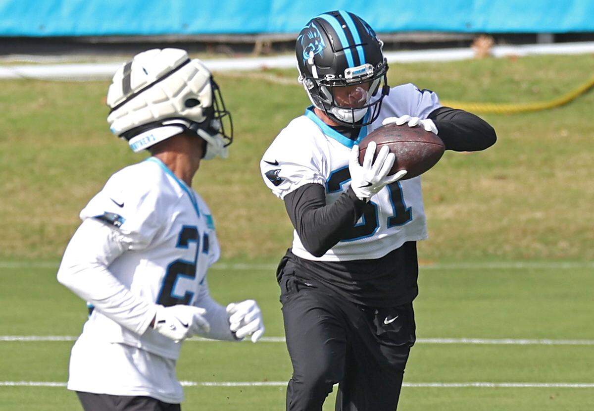 Carolina Panthers cornerback Caleb Farley catches a ball during drills on Monday, November 18, 2024.