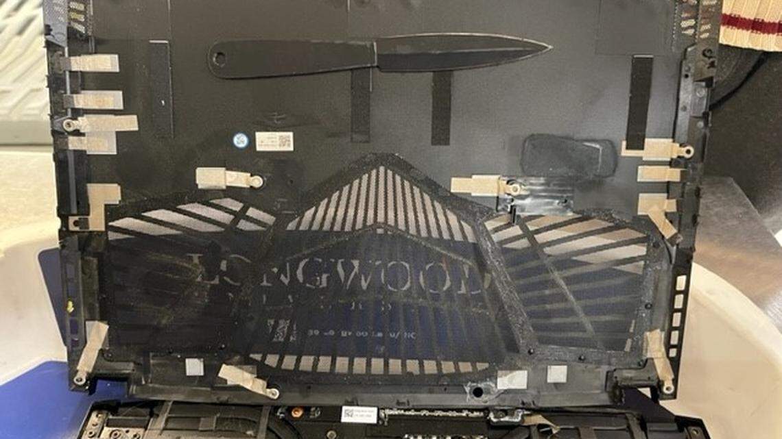 The weapon was “artfully concealed inside the guts of the computer,” officials said.