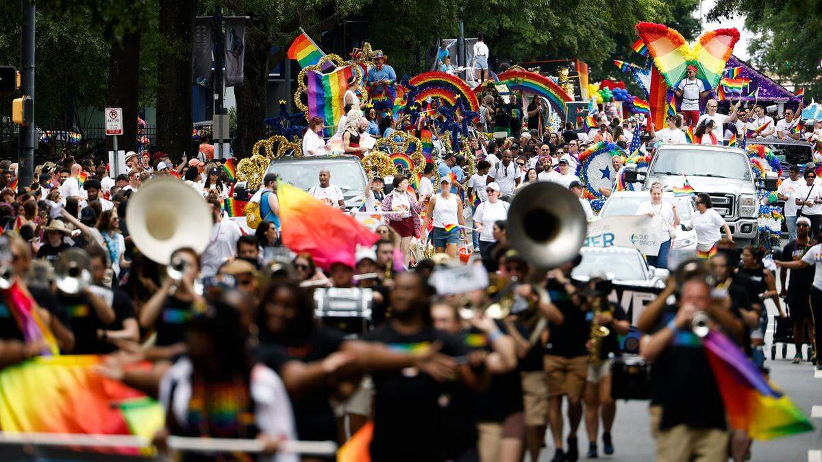 Thousands of people fill Tryon Street during the Charlotte Pride Parade through uptown, Sunday, Aug. 21, 2022. 