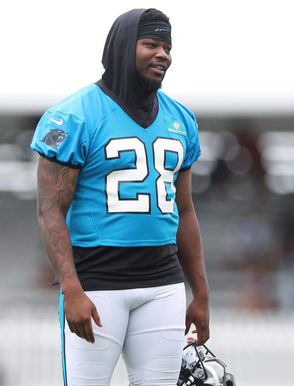 Carolina Panthers running back Rashaad Penny waits for the start of training camp practice on Thursday, July 25, 2024.