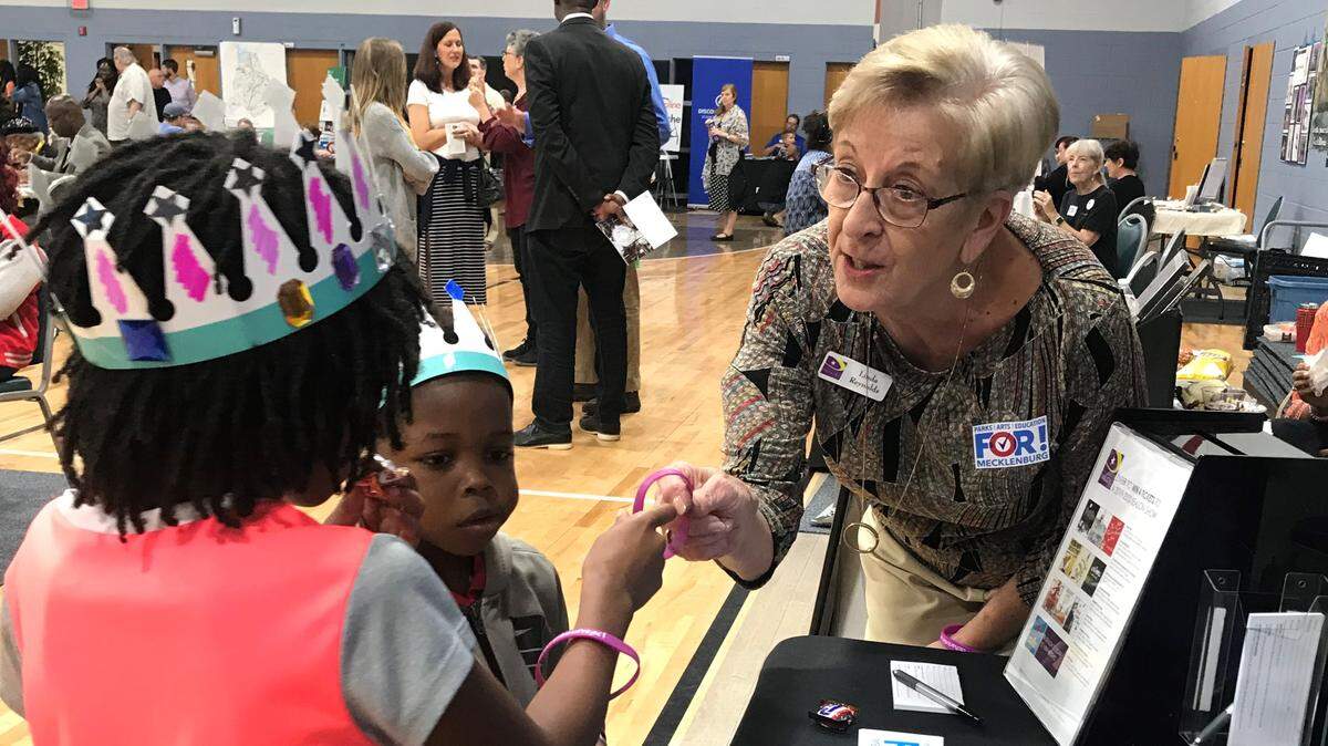 Linda Reynolds of Children’s Theatre of Charlotte speaks with children at a 2019 ASC event. Reynolds, who is retiring from CTC, helped start The Kindness Project, which was created to inspire children to see the good that is possible in the world and emulate it.