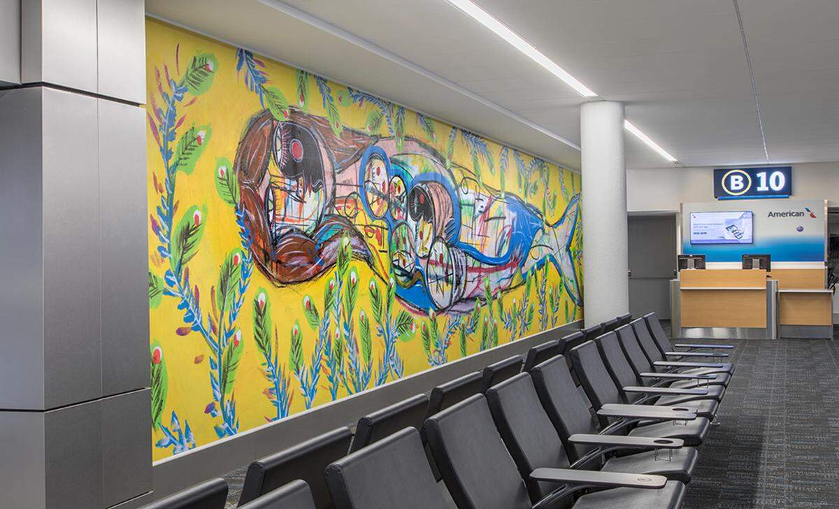 The mural “We are All on the Same Plane” by Nico Amortegui was one of the four murals commissioned by local artists for the renovated concourse.