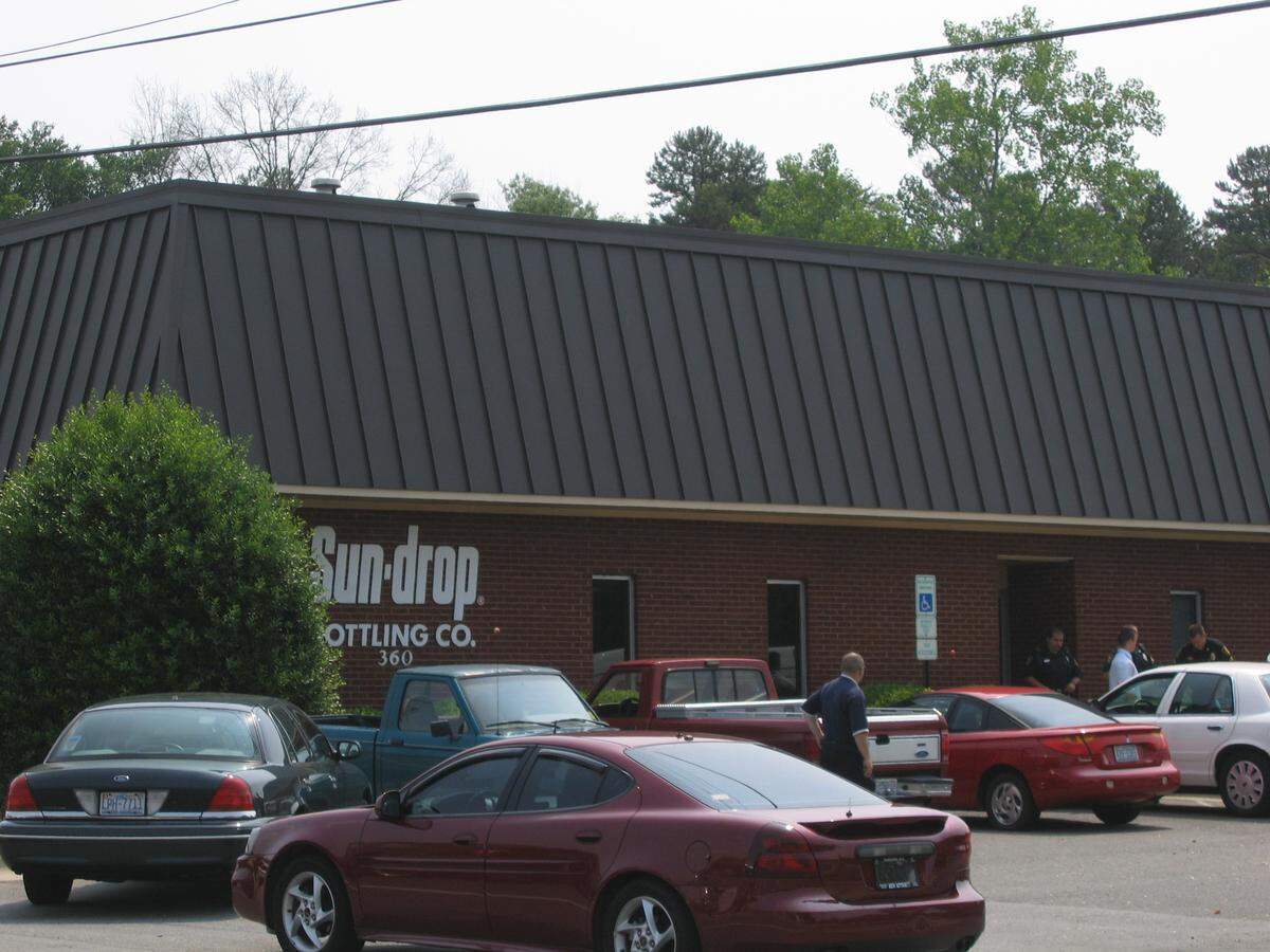 The Sun Drop Bottling Co. in Concord, seen on the morning of June 13, 2008, when it was the site of a double shooting. Authorities searched for a suspect using police helicopters and canine units. 