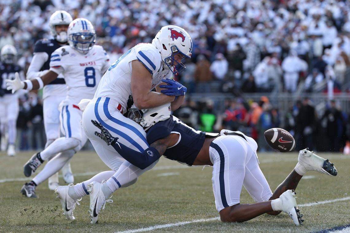 Penn State’s Zakee Wheatley breaks up a pass intended for SMU’s Matthew Hibner during a 2024 game. 