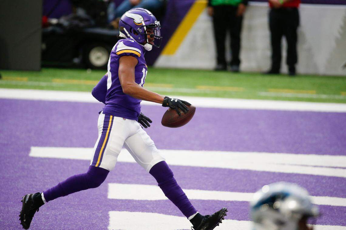 Minnesota Vikings wide receiver Justin Jefferson catches a 12-yard touchdown pass during the first half of an NFL football game against the Carolina Panthers, Sunday, Nov. 29, 2020, in Minneapolis. (AP Photo/Bruce Kluckhohn)