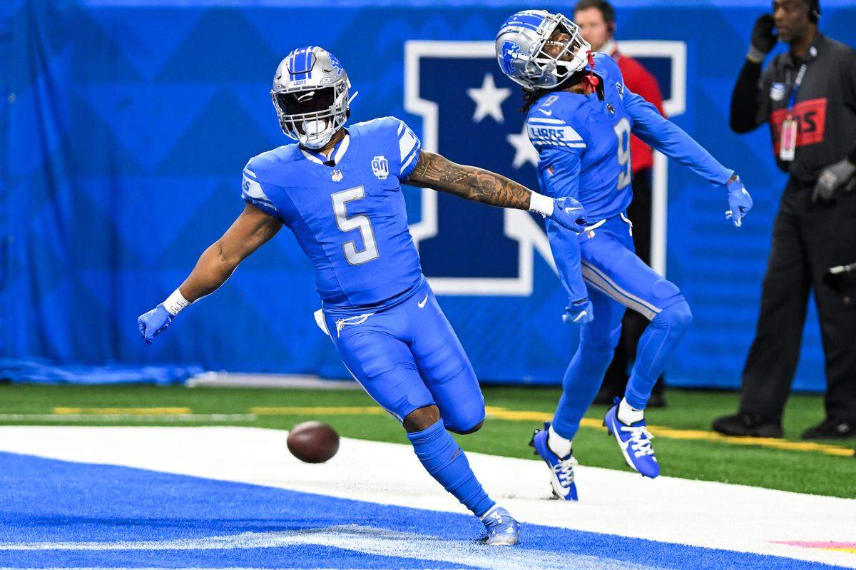 Oct 8, 2023; Detroit, Michigan, USA; Detroit Lions running back David Montgomery (5) celebrates in the end zone with wide receiver Jameson Williams (9) after running for a touchdown against the Carolina Panthers in the first quarter at Ford Field. Mandatory Credit: Lon Horwedel-USA TODAY Sports
