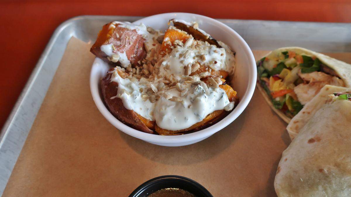 Roasted sweet potatoes and a ‘Original Oriental’ Wrap at Harper’s Cafe in Pineville.