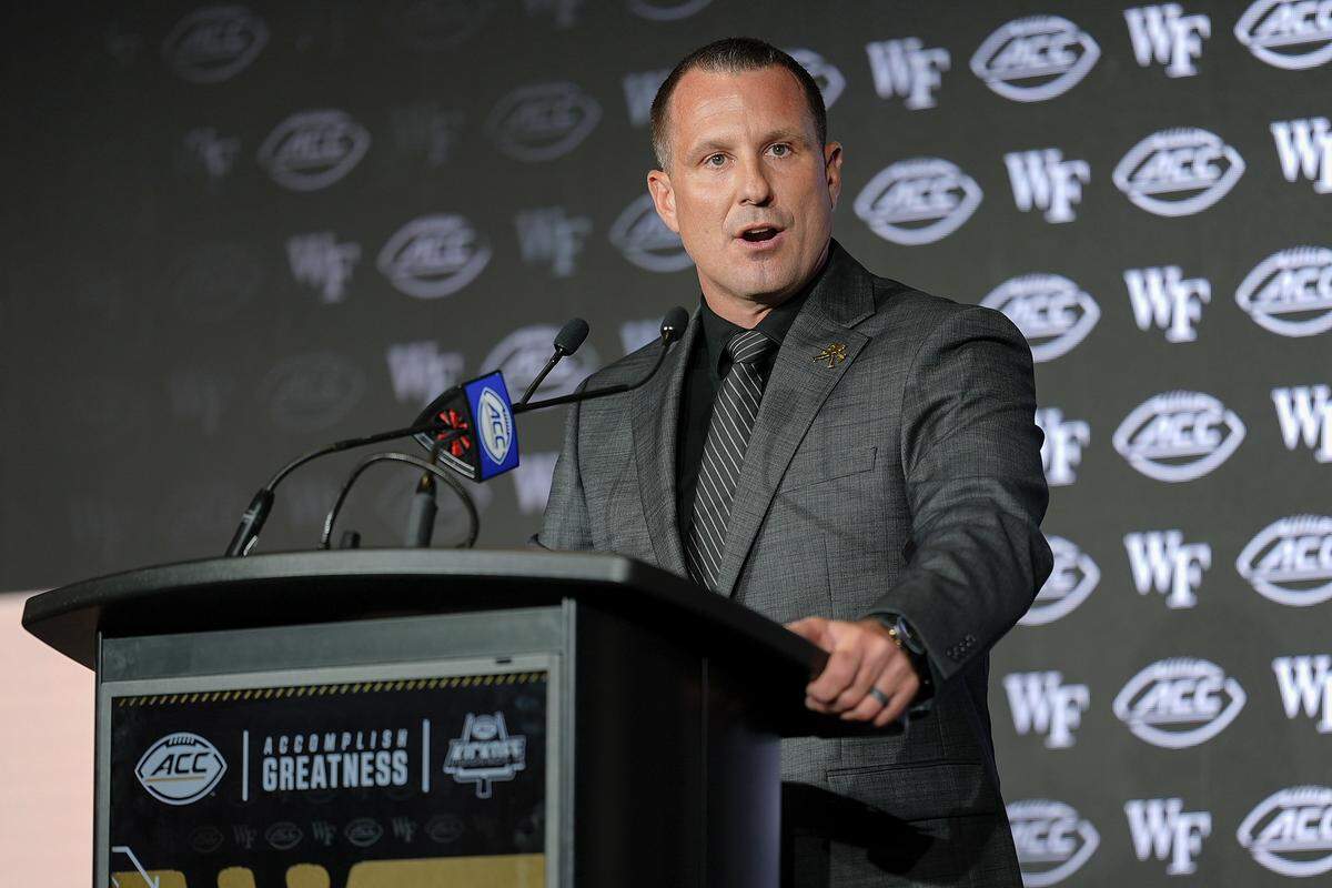 Wake Forest head coach Jake Dickert answers questions from the media during ACC media days Wednesday at Hilton Charlotte Uptown. Jim Dedmon-Imagn Images