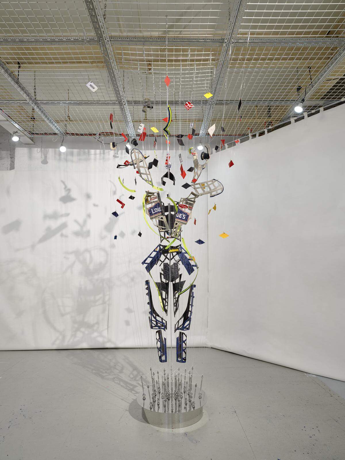 Another view of the “Daytona Vortex.” Sixty points of fishing line go to eyebolts in the ceiling, holding all the elements of the suit at different heights.