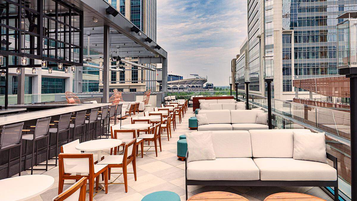 Aura Rooftop is on the fifth floor of the JW Marriott in uptown. Visit for botanical craft cocktails, boutique wines and small bites.