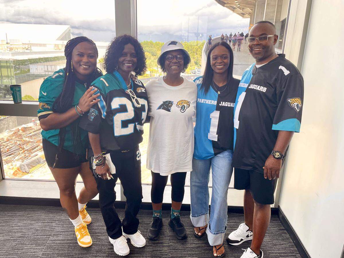 The family of Travis and Trevor Etienne showed out at EverBank Stadium in Jacksonville, Fla. From left to right: Shanea Lyons (sister), Donnetta Etienne (mother), Cynthia Lyons (grandmother), Danielle Lyons (sister), Travis Etienne Sr. (father).