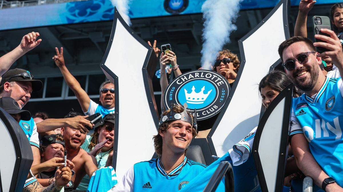 Charlotte FC’s Ben Bender mingles with fans as he is crowned Man of the Match after the team’s win, 2-0, over the New York Red Bulls at Bank of America Stadium in Charlotte, June 11, 2022.