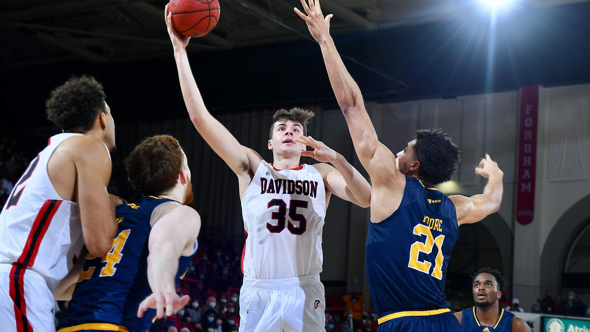 Luka Brajkovic (35), Davidson’s starting center, shoots against LaSalle during the 2021-22 season.