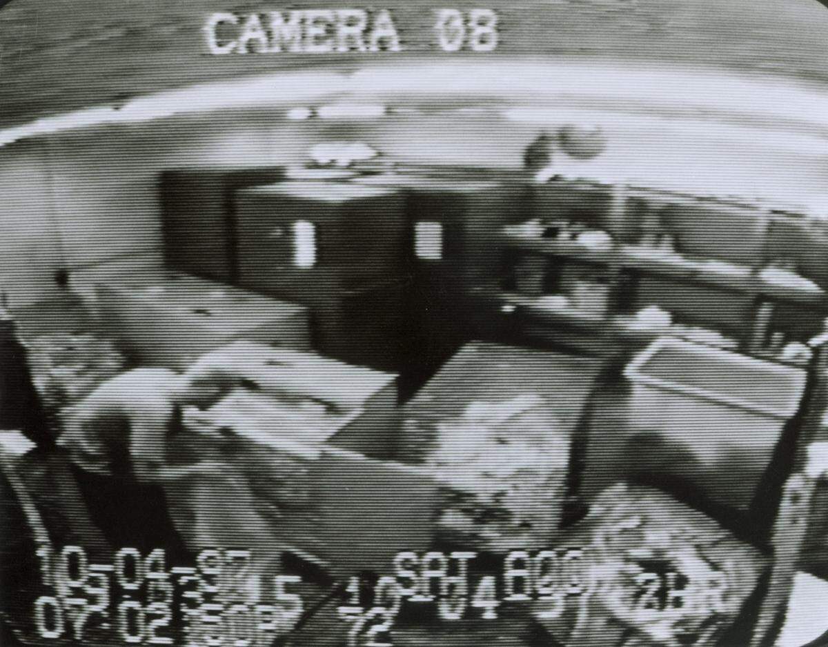 Surveillance photos provided by the FBI show David Scott Ghantt stealing $17 million from the Loomis Fargo armored car company in Charlotte in October 1997.
