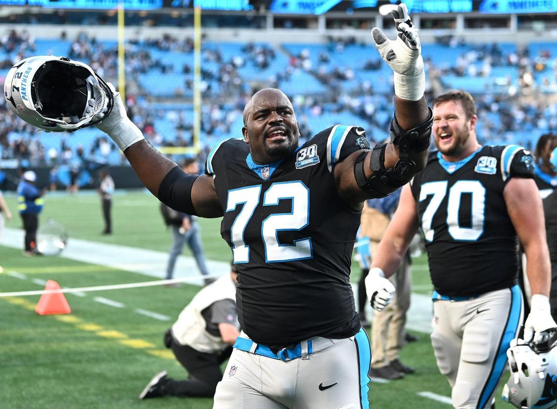Carolina Panthers tackle Taylor Moton, left and guard Brady Christensen, right, celebrate the team’s 23-22 victory over the New Orleans Saints at Bank of America Stadium in Charlotte, NC on Sunday, November 3, 2024.
