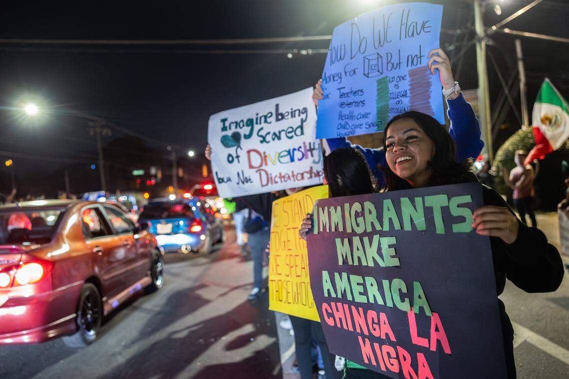Protesters gather outside of Manolo’s Bakery to protest ICE and Border Patrol in Charlotte, N.C., on Wednesday, November 20, 2025.