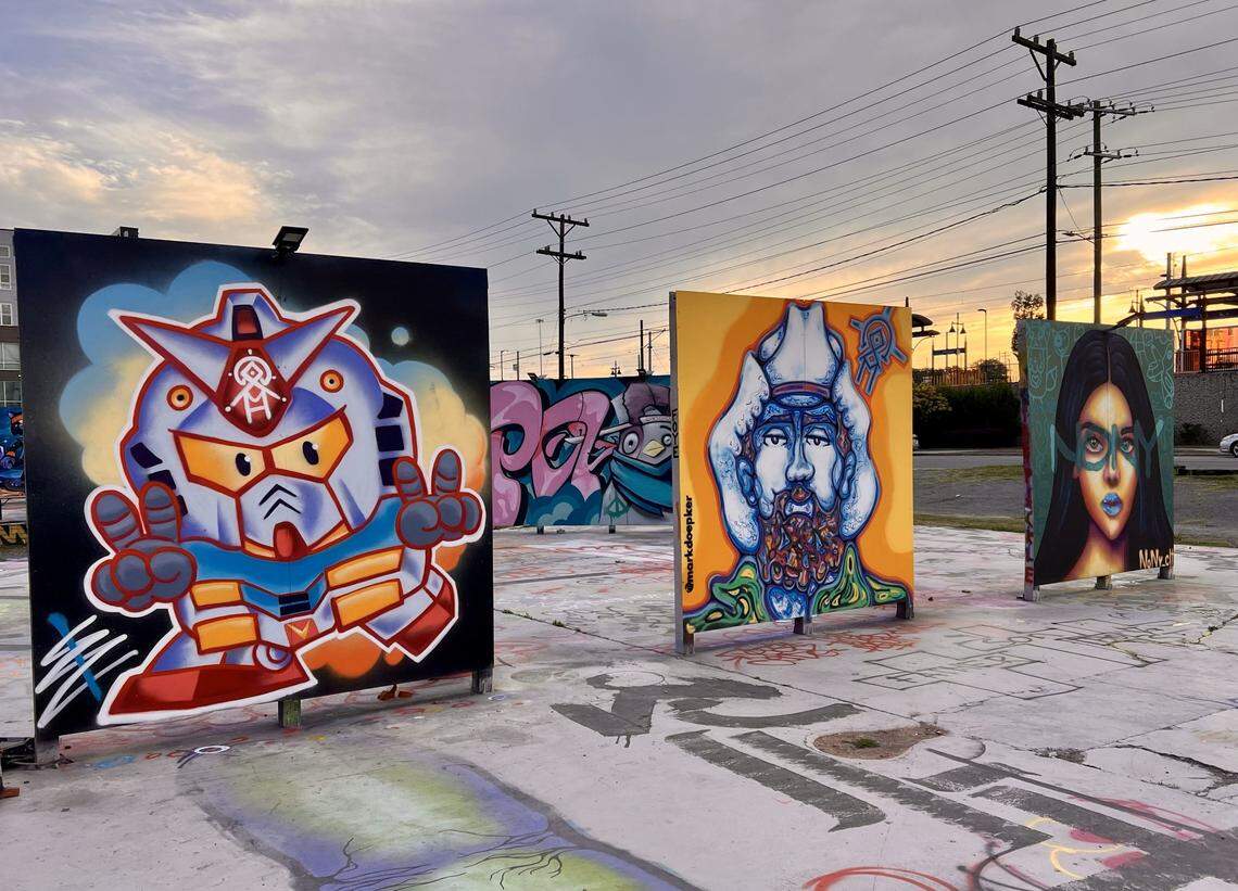 There are more than 25 walls of different dimensions for artists to paint day or night at the TAOH Outdoor Gallery. These works, left to right, come from artists Eulizerd and Mark Doepker, Nony_CLT, and Joey Obso in the second row.