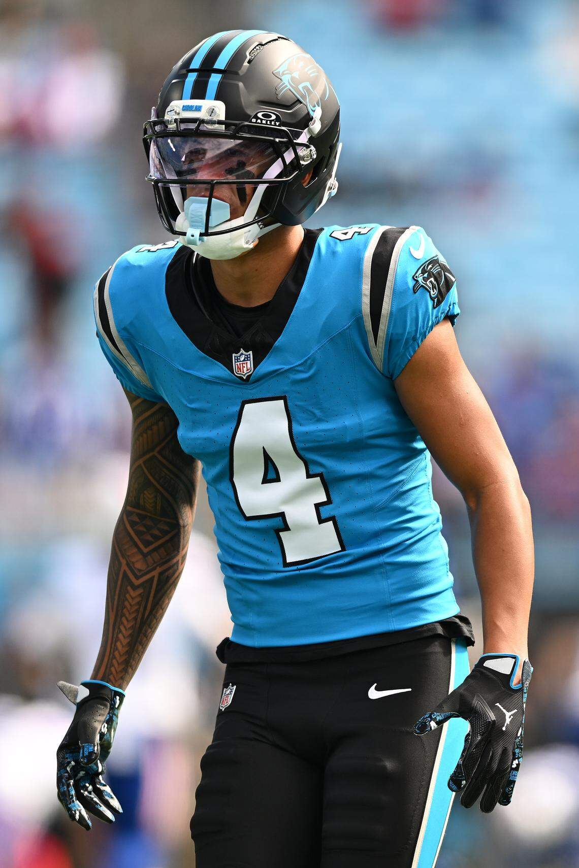 CHARLOTTE, NORTH CAROLINA - OCTOBER 26: Tetairoa McMillan #4 of the Carolina Panthers warms up prior to the game against the Buffalo Bills at Bank of America Stadium on October 26, 2025 in Charlotte, North Carolina. (Photo by Matt Kelley/Getty Images)