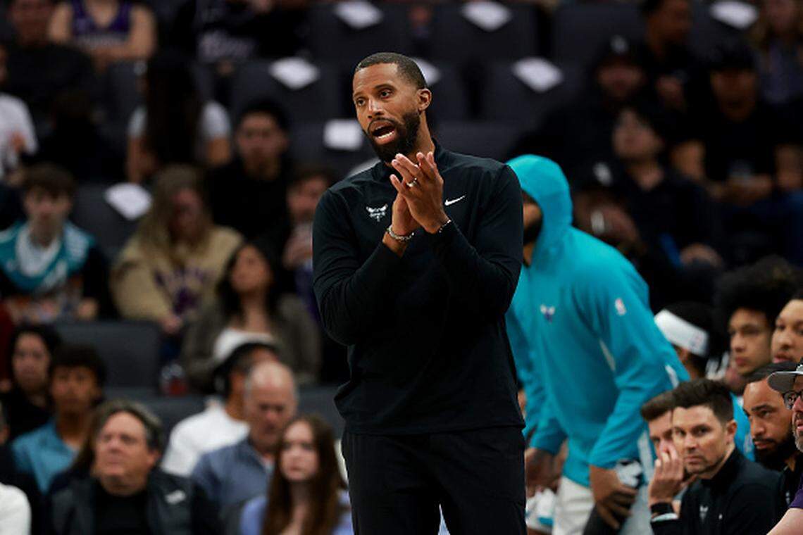 Head coach Charles Lee of the Charlotte Hornets stands on the side of the court during their game at Golden 1 Center.