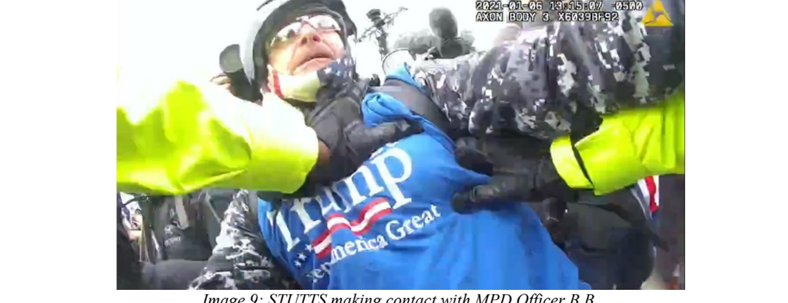 In this body cam image included in an affidavit charging him with assaulting officers in the Jan. 6 Capitol breach, Lee Stutts of Lake Norman shoves a Metropolitan Police officer in the chest, federal prosecutors said.