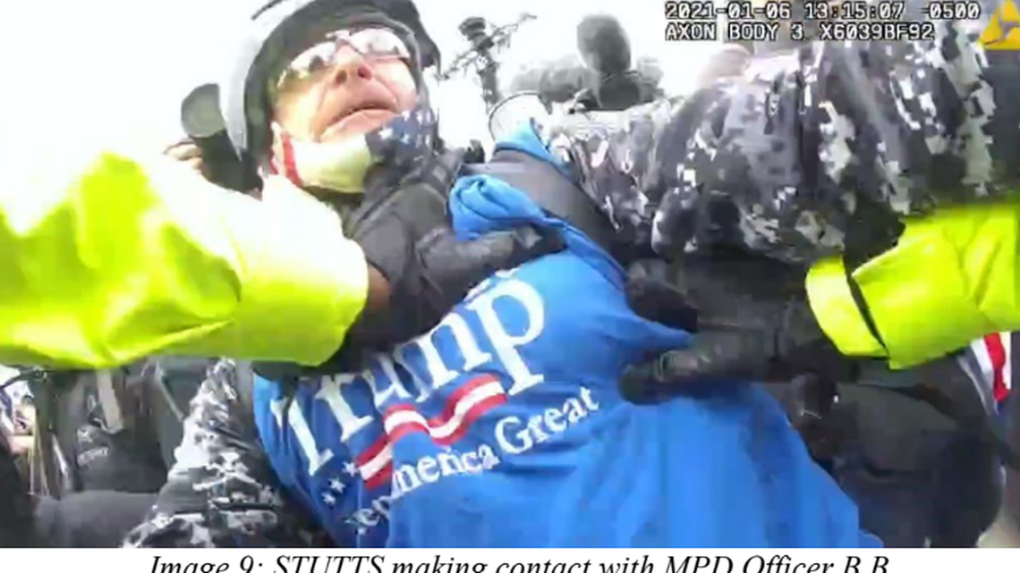 In this body cam image included in an affidavit charging him with assaulting officers in the Jan. 6 Capitol breach, Lee Stutts of Lake Norman shoves a Metropolitan Police officer in the chest, federal prosecutors said.