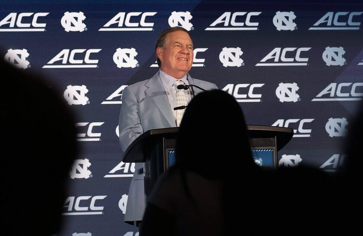 North Carolina head football coach Bill Belichick laughs after saying he felt like he was in a lineup under the bright lights during the 2026 ACC Football Kickoff program at the Charlotte Hilton Uptown hotel on Friday, July 17, 2026.