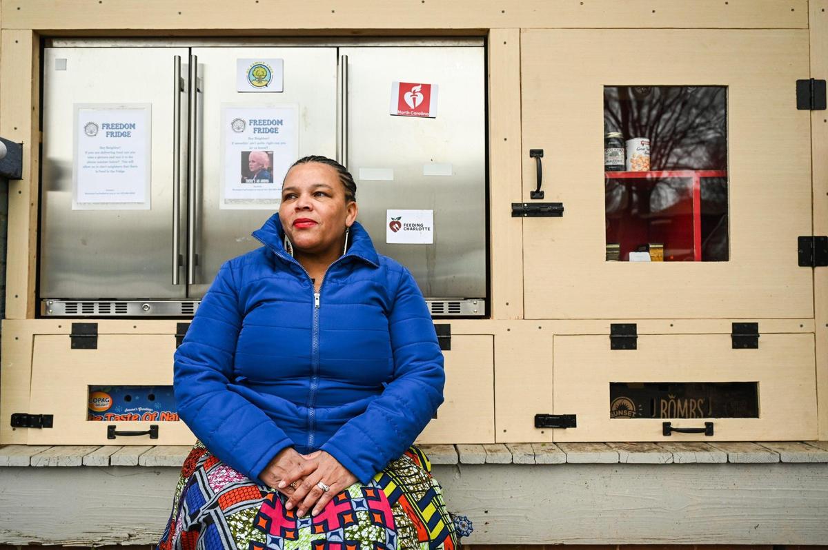 “This is mutual aid at its finest,” says Shamaiye Haynes, co-director of QC Family Tree, which provides Freedom Fridge, a place where people can take food when they are in need at no cost. Haynes sits in front of the Freedom Fridge at 2916 Parkway Ave. in Charlotte.