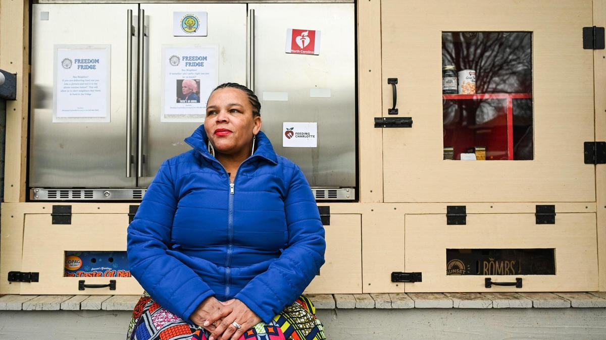“This is mutual aid at its finest,” says Shamaiye Haynes, co-director of QC Family Tree, which provides Freedom Fridge, a place where people can take food when they are in need at no cost. Haynes sits in front of the Freedom Fridge at 2916 Parkway Ave. in Charlotte.