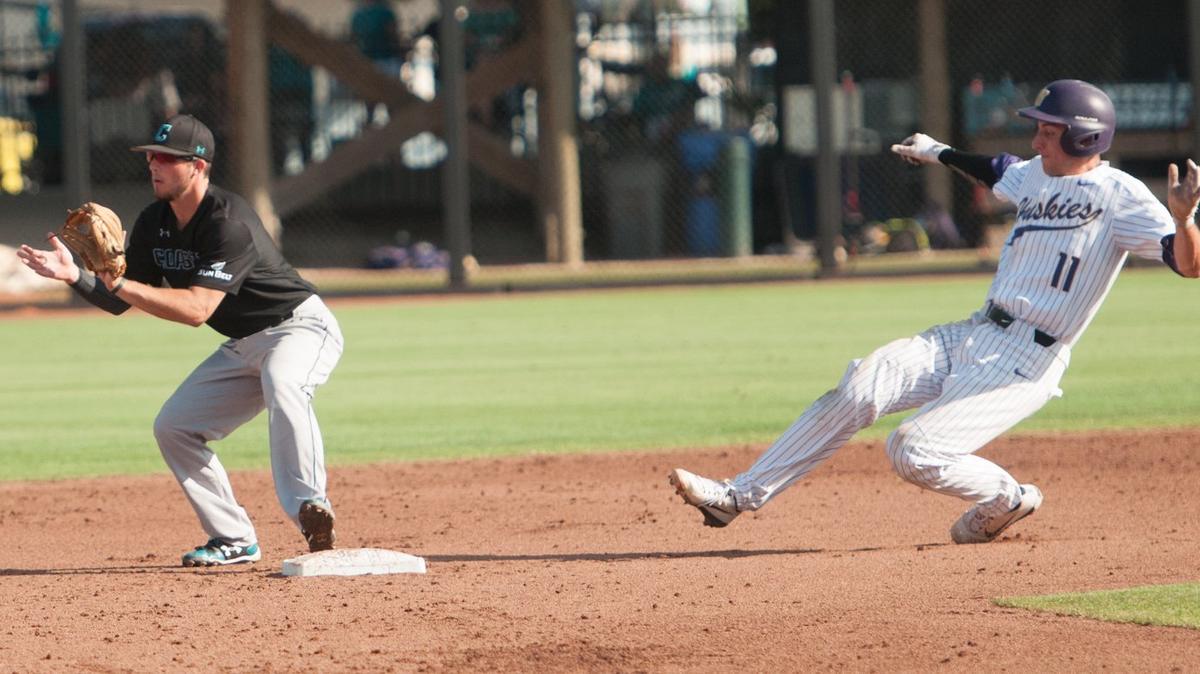 A.J. Graffanino slides into second base in Washington's 11-6 win over Coastal Carolina on Saturday. Graffanino hit a three-run double in the eighth inning Sunday in Washington's 9-6 win over UConn that captured the NCAA Conway Regional at Springs Brooks Stadiium.