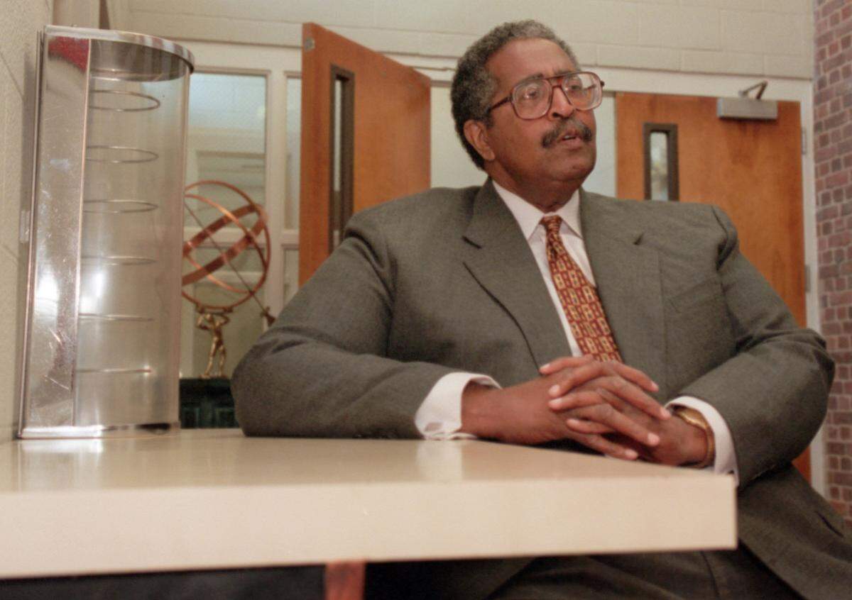 DURHAM, NC -- 11/17/99 -- Franklin McCain, one of the original lunch counter protesters from the Greensboro Woolworth, sits in a small portion of the lunch counter from the Durham Woolworth, which is at NCCU now in the Jones Building. Vicki Cheng story.