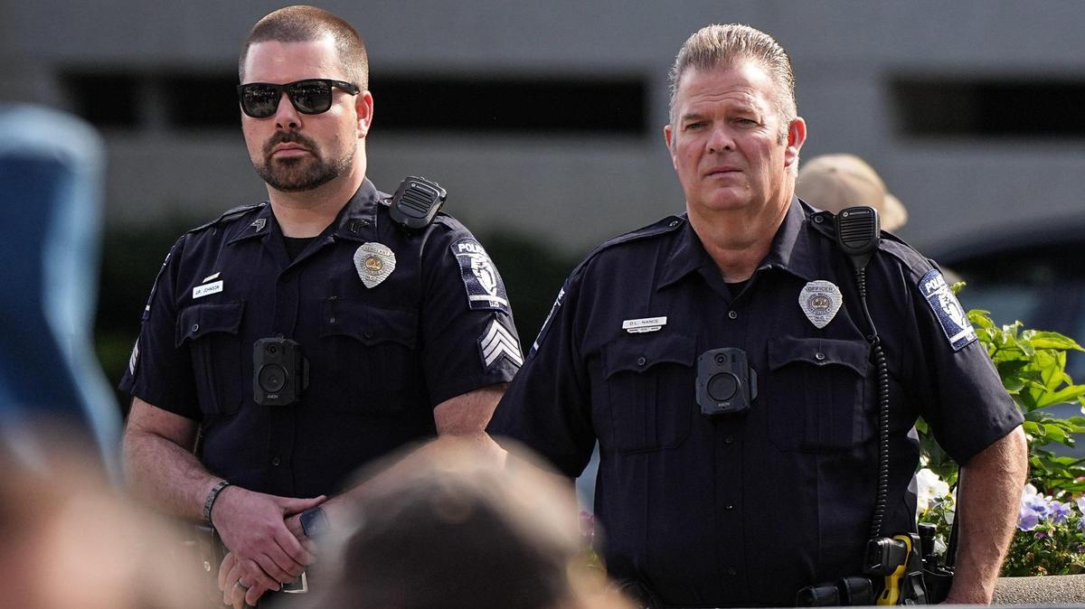 Charlotte-Mecklenburg Police Department officers look on during remarks prior to the Tunnel to Towers Tower Climb at Bank of America stadium, Sunday, April 27, 2025, in Charlotte, N.C.