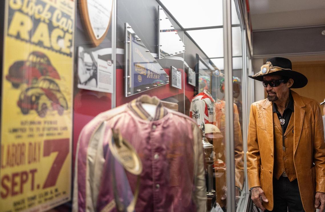 NASCAR Hall of Famer Richard Petty looks at the Darlington Raceway 75th Anniversary Exhibit at the NASCAR Hall of Fame Charlotte, N.C., on Tuesday, March 18, 2025.