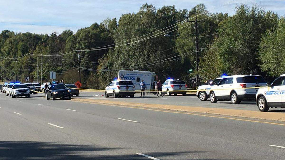 Police investigate after a man was found shot inside a vehicle at the intersection of E. W.T. Harris Blvd and Duncroft Lane in Charlotte. 