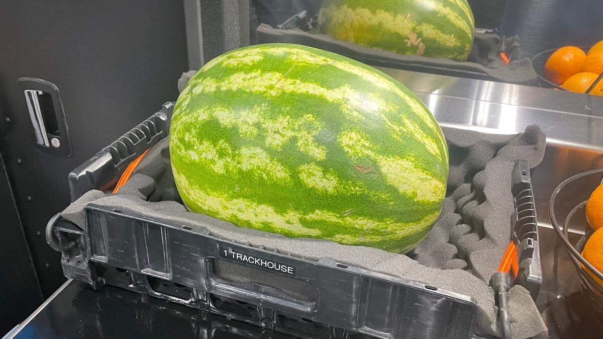 A watermelon sits in Trackhouse Racing Team’s No. 1 Chevrolet hauler at Martinsville Speedway. The melon travels in a crate made for transporting it to NASCAR events for driver Ross Chastain to smash when he wins.