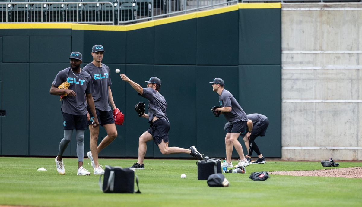 Charlotte Knights players practice during the Charlotte Knights preseason media day at Truist Field in Charlotte, N.C., on Thursday, March 28, 2024.
