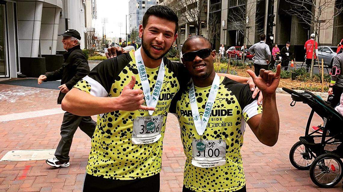 When Davian Robinson, right, helped Jordan Scott reach his lifelong dream of running a 5K, it was just the beginning of the challenges the two would take on together.