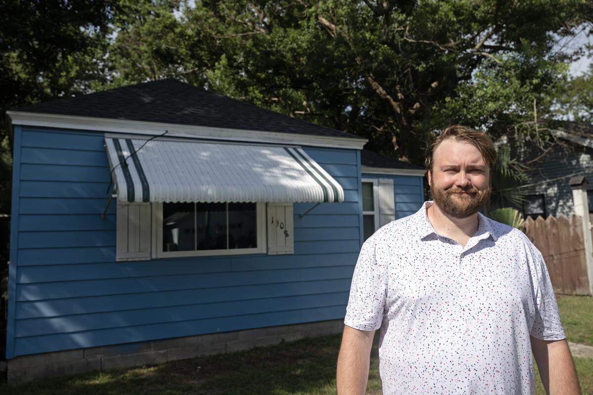 Myles McGill stands in front of his Biloxi home, which has a roof strengthened against hurricane damage. A FORTIFIED certification from the Institute for Business and Home Safety qualified him for a discount on homeowners insurance and means he should have less damage if disaster strikes. Through Habitat for Humanity Mississippi Gulf Coast, McGill received a Federal Home Loan Bank of Dallas grant that covered most of the work.