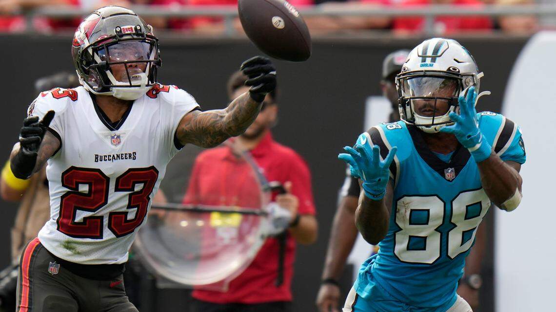 Carolina Panthers wide receiver Terrace Marshall Jr. catches a pass in front of Tampa Bay Buccaneers cornerback Sean Murphy-Bunting during the second half of an NFL football game between the Carolina Panthers and the Tampa Bay Buccaneers on Sunday, Jan. 1, 2023, in Tampa, Fla. (AP Photo/Chris O’Meara)