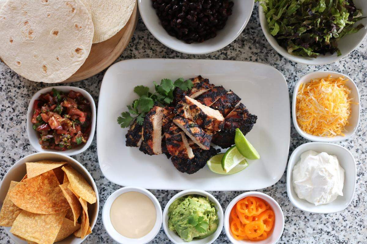 Starting at $89, the Further South kit comes with your choice of taco filling – beef, chicken or carnitas — plus corn and flour tortillas, sour cream, shredded cheese, house-made salsa, guacamole, queso dip, pickled pepper, shredded lettuce, smoked chili black beans and tortilla chips