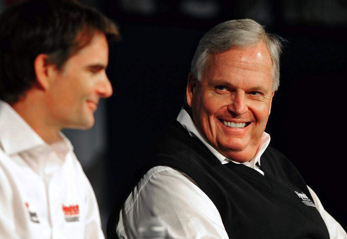 (Right-Left) NASCAR team owner Rick Hendrick smiles at driver Jeff Gordon in 2012 during the NASCAR media tour. Gordon won four of Hendrick Motorsports’ 14 NASCAR Cup series championships.
