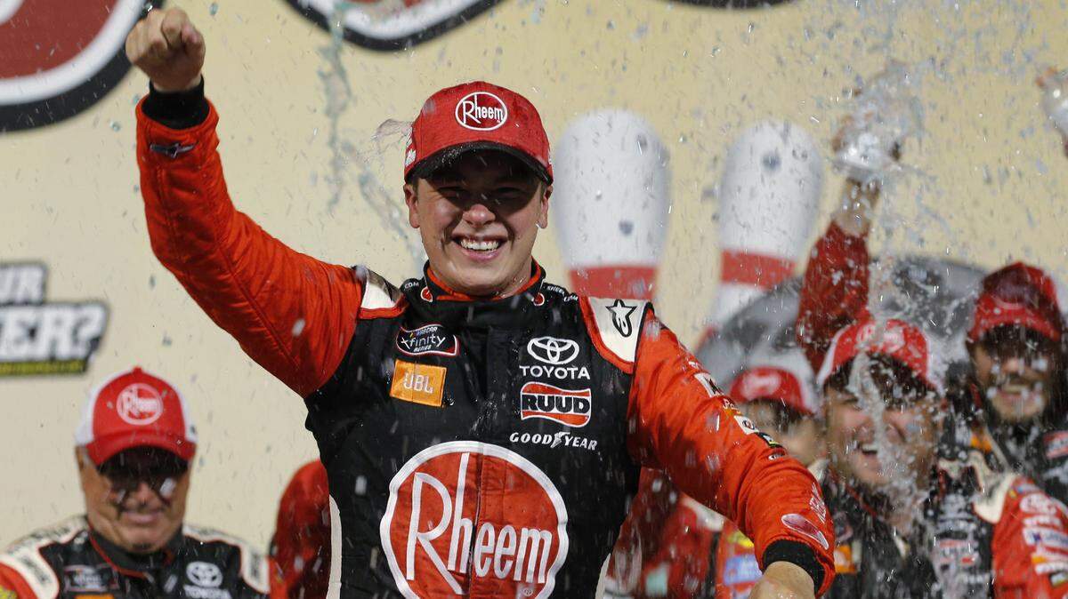 Christopher Bell celebrates his win in the NASCAR Xfinity Series auto race in Victory Lane at Richmond Raceway in Richmond, Va., Friday, Sept. 20, 2019. (AP Photo/Steve Helber)