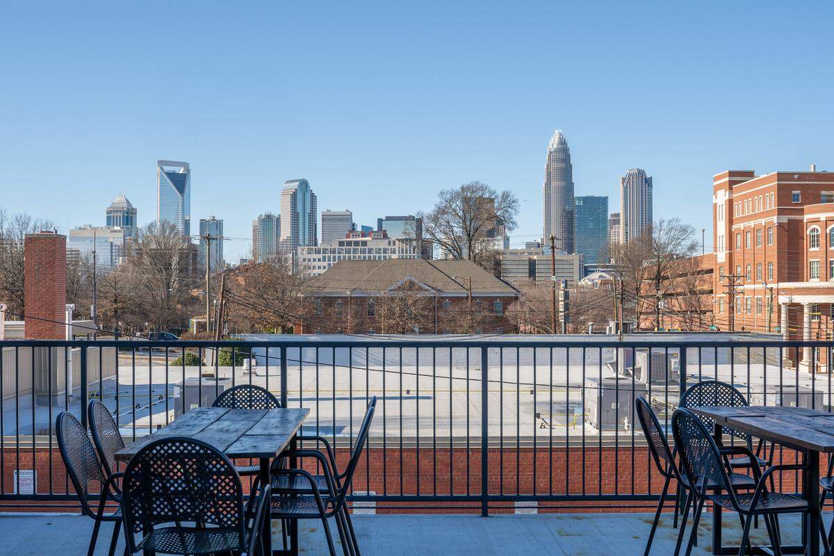The upstairs patio at Devil’s Logic Brewery has a great view of the Charlotte skyline.