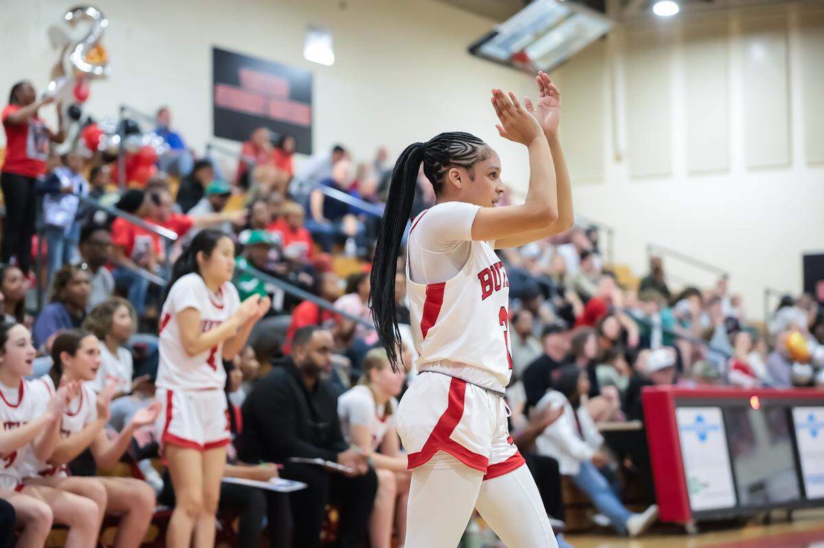 Butlers Eshe Muhammad celebrates as her team takes a win over Charlotte Catholic on February 7th, 2025 at Butler high school in Matthews, NC